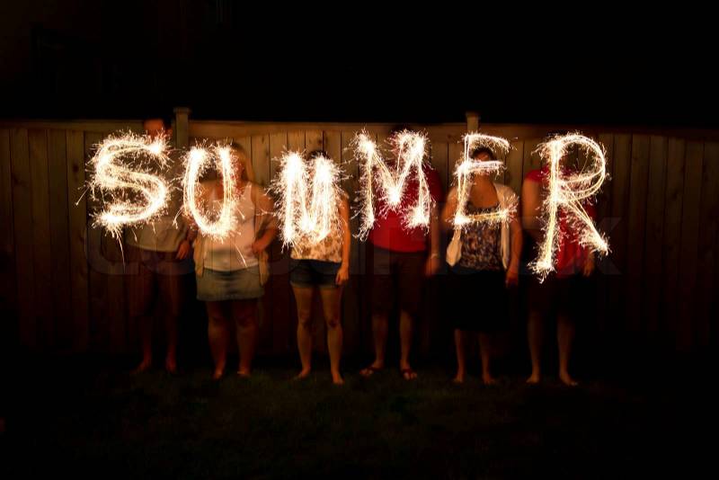 The word Summer in sparklers time lapse photography, stock photo