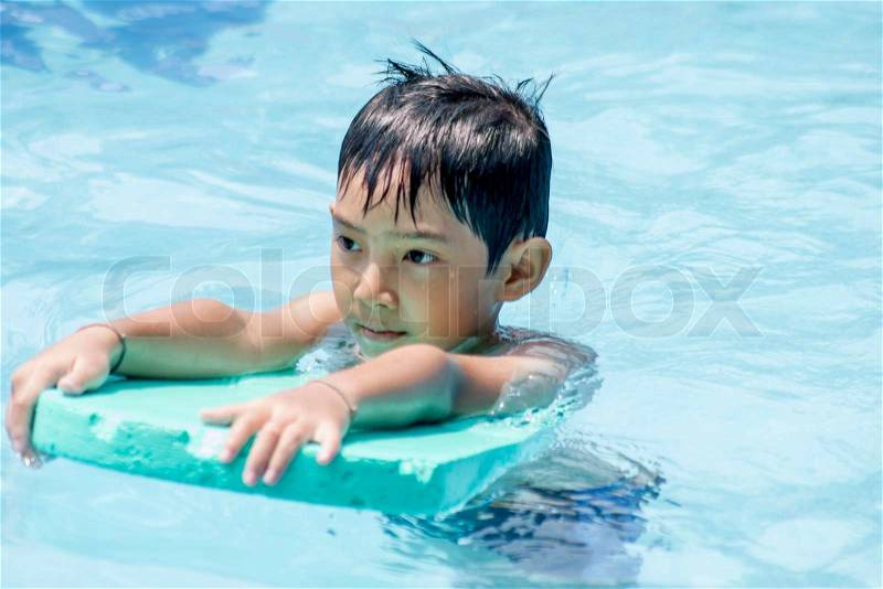 Asian Boy training swim, stock photo