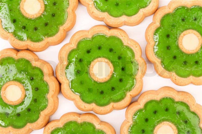 Background of biscuit with kiwi jam. Whole background, stock photo