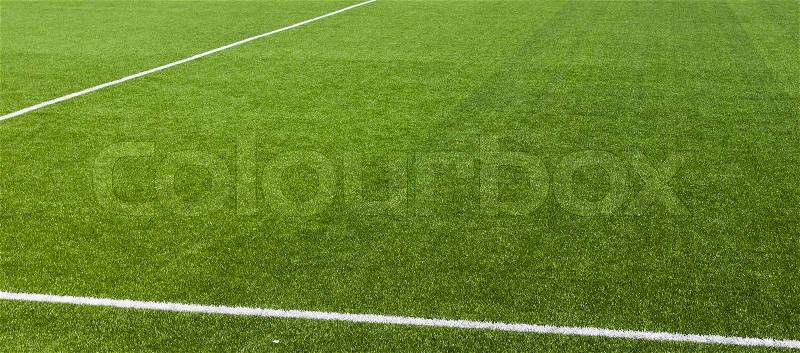 White stripe on the green soccer field from top view, stock photo