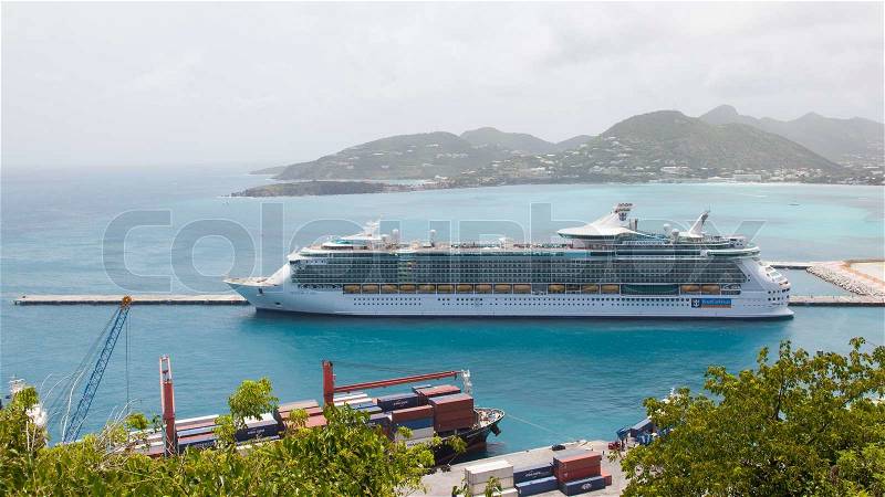ST MARTIN, ANTILLES - JULY 18, 2013: Cruise ship Freedom of the Seas, anchored at St. Martin on July 18, 2013. Passengers have to be tendered to the island for day excursions. July 18, 2013, stock photo