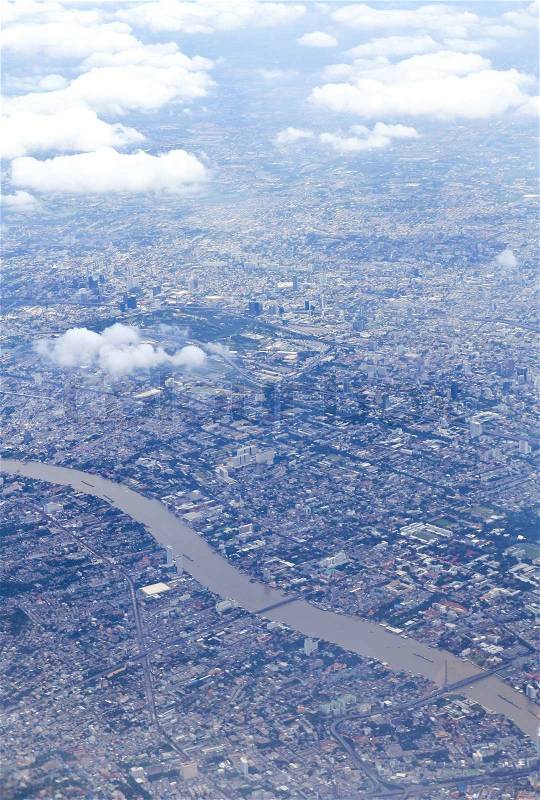 Kind on a city from an airplane from the height of bird flight, stock photo