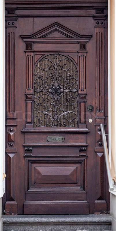 Wooden front door of a home Old Wooden Door, stock photo