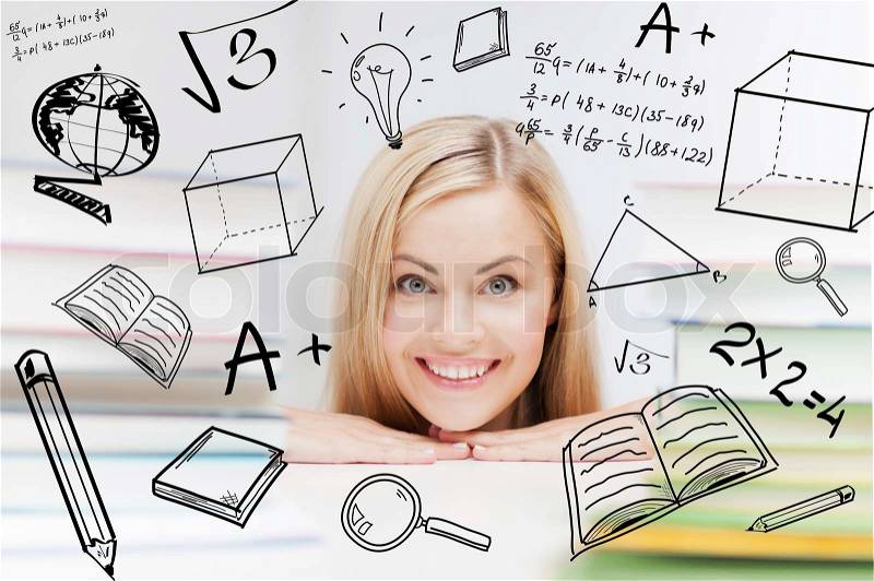 Education and school concept - smiling student with stack of books and doodles, stock photo