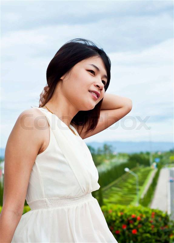 Beautiful Asian woman relaxing, stock photo