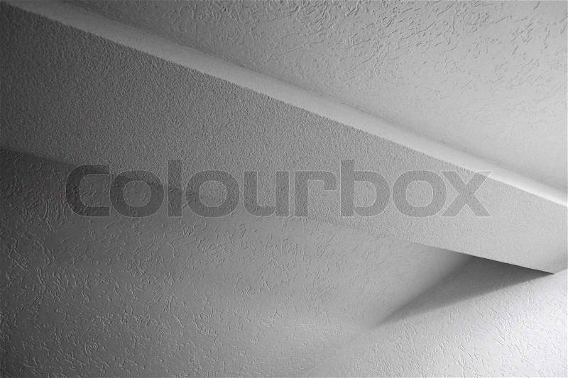 Abstract white interior fragment with beam and walls, stock photo