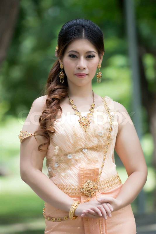 Thai woman wearing typical Thai dress, stock photo