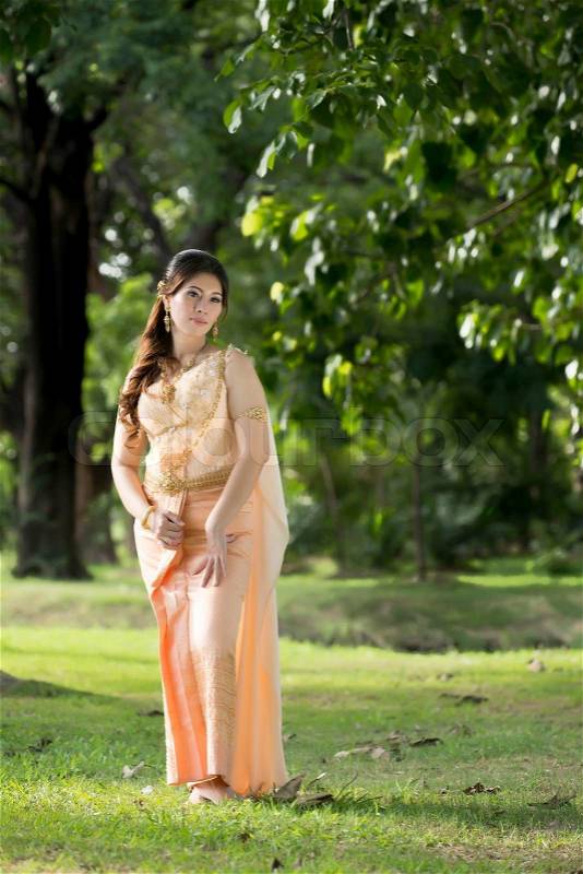 Thai woman wearing typical Thai dress, stock photo