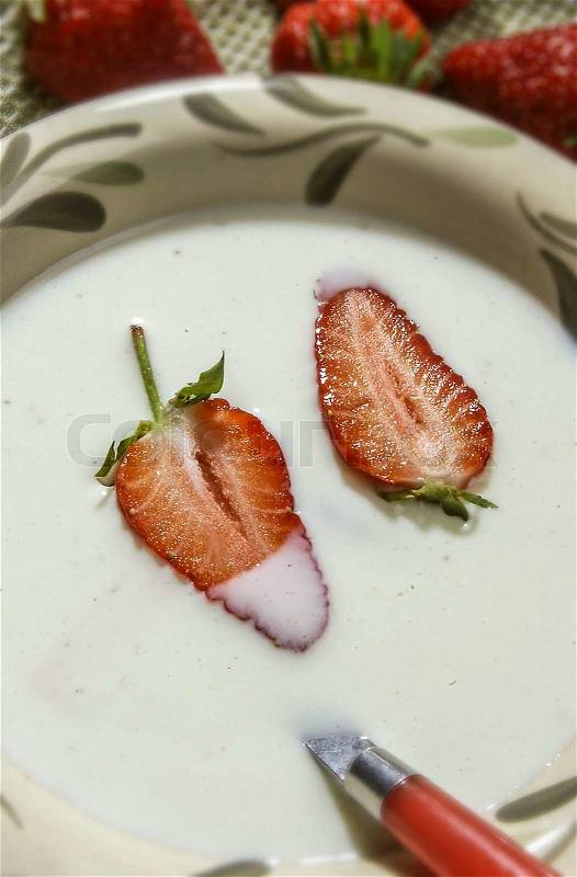 Buttermilk dessert with strawberries, stock photo