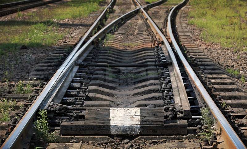 Fragment of Railway track with switch, stock photo