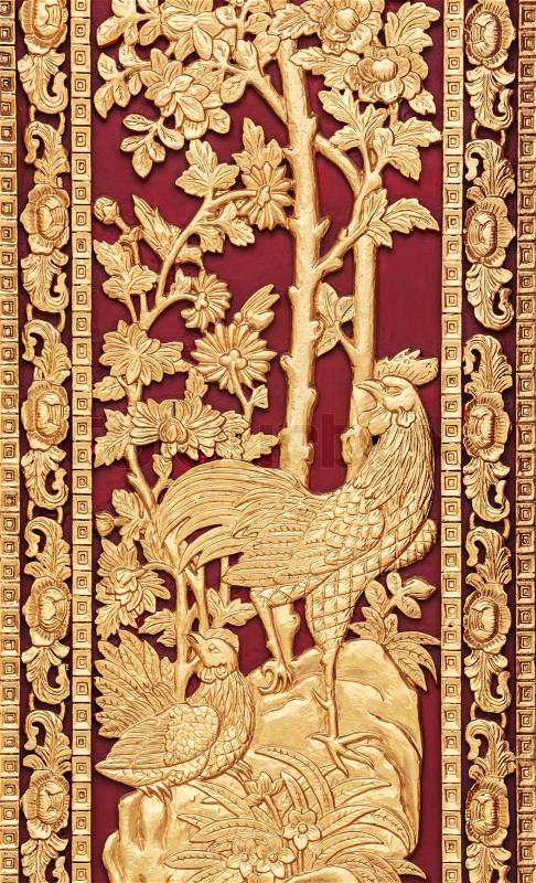 Mythical Thai Style Carving onWooden Temple Door, General Thai Temple Art, stock photo