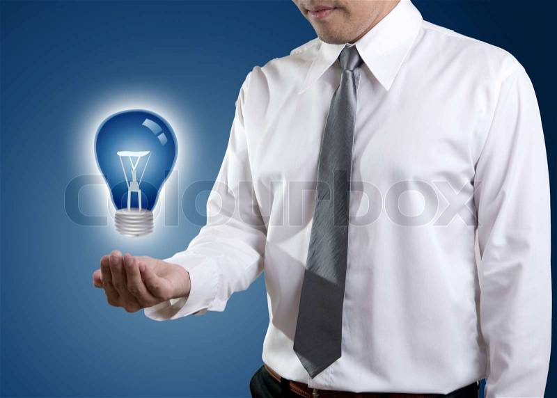 Light bulb in hand, stock photo