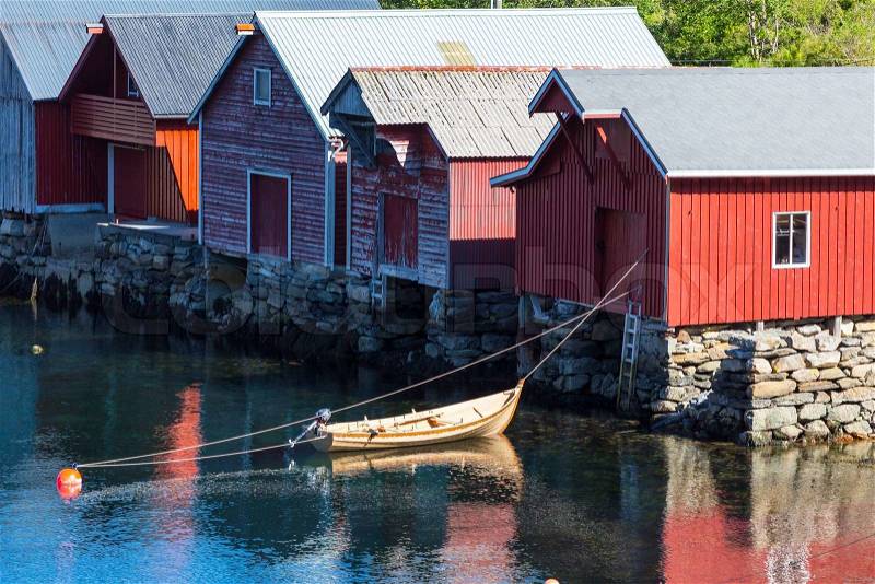 Red wooden fishing cabins in Norway, stock photo