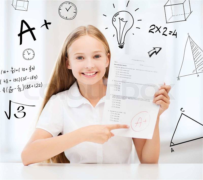 Education and school concept - little student girl with test and A grade at school, stock photo