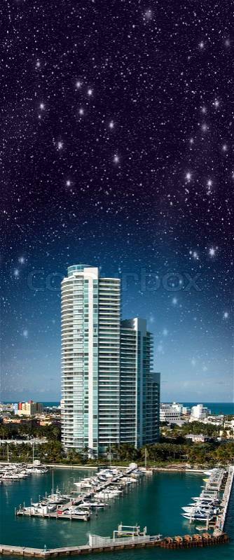 Night over Miami. Starry sky above city buildings - Florida - USA, stock photo