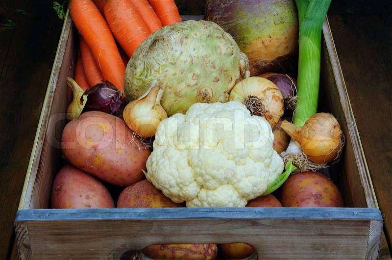 Root vegetables in a box. Ingrediens for a soup, stock photo