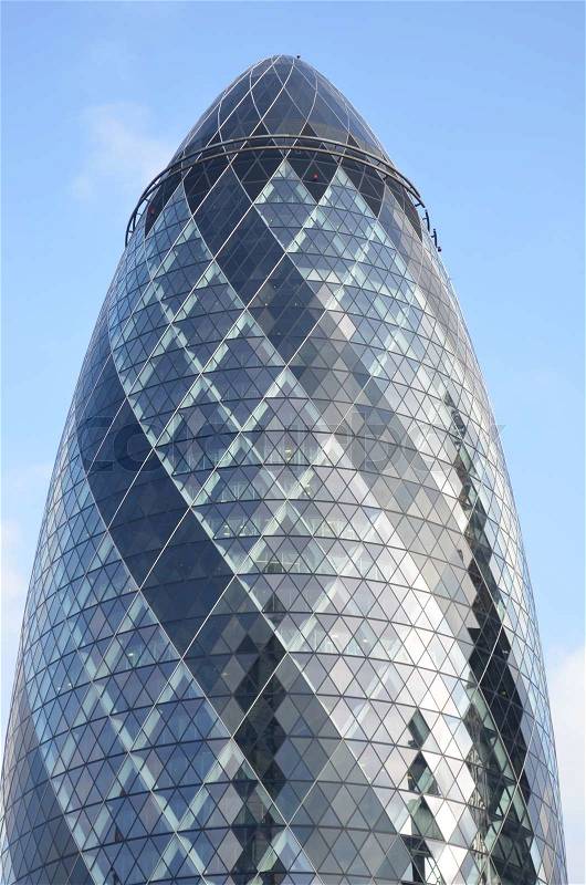 The top of the glass covered gherkin looking Swiss Re building in central London, stock photo