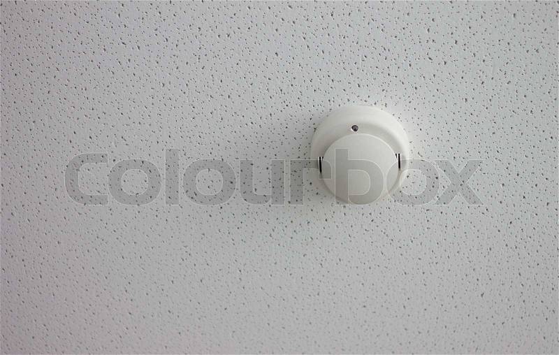 Fire alarm sensor on the ceiling, stock photo