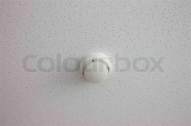 Fire alarm sensor on the ceiling, stock photo