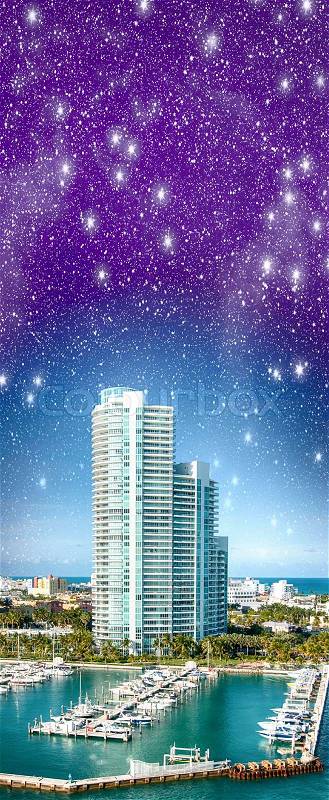 Night over Miami. Starry sky above city buildings - Florida - USA, stock photo