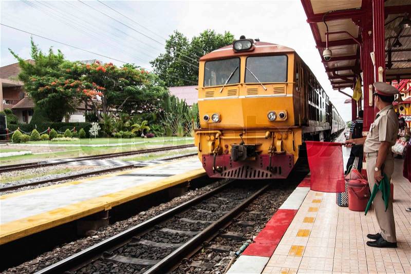 Thai colorful train arriving at station, stock photo