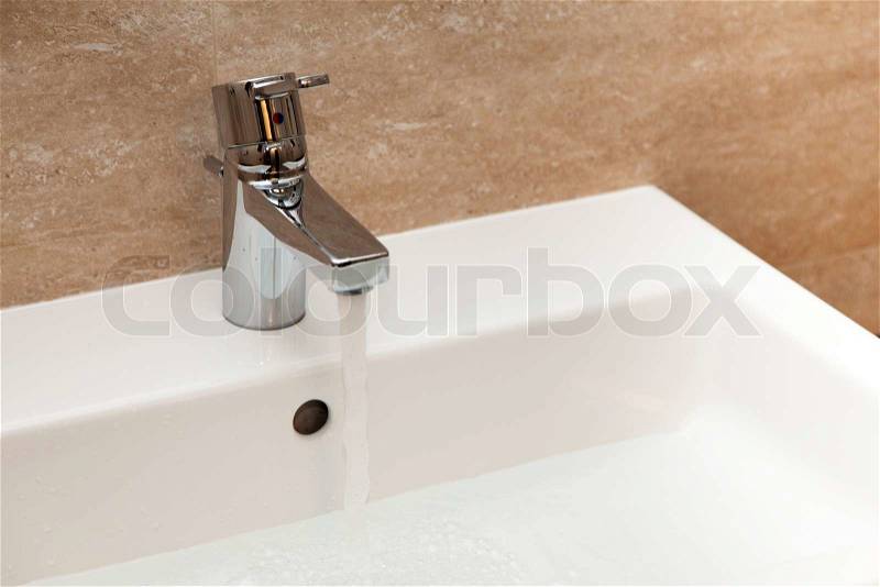 Modern water faucet, stock photo