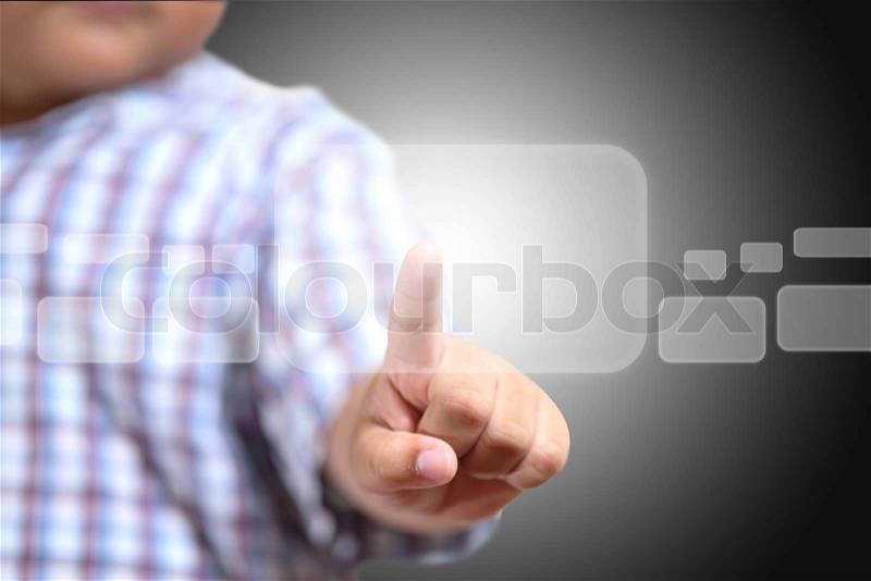 Hand of little Boys pushing on touch screen interface, stock photo