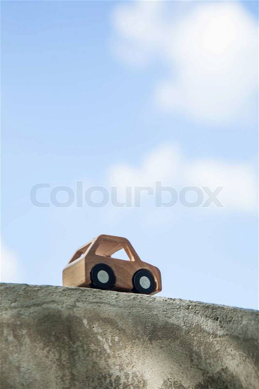 Dream concept. Wooden car model, stock photo