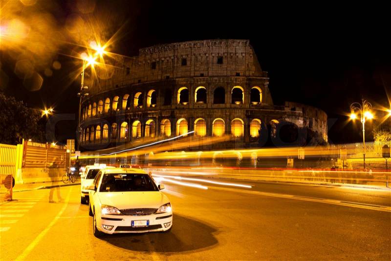 A travel through time - Colosseum has been there watching people come and go for almost 2000 years, stock photo