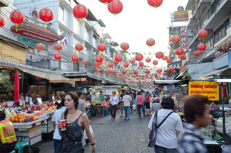 BANGKOK - December 30: Red lanterns and decorations span Yaowarat Road in Bangkok\'s Chinatown district during the Chinese New Year celebrations on December , 2011 in Bangkok, Thailand, stock photo