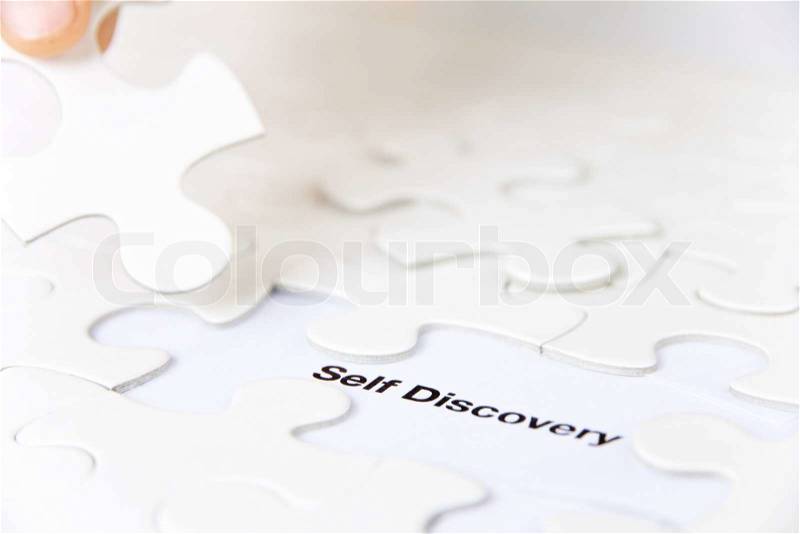 Missing puzzle piece, self discovery concept, stock photo