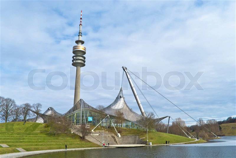 In 1972 the Olympic Games where taking place in Munich. For these games they build the Olympia Park with stadiums a lake and a little hill. Since then the park is open for the public and it\'s worth a walk with the camera. Even from the hill you have a vie