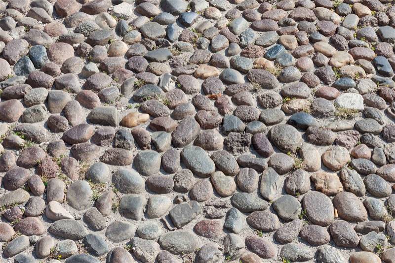 The stone pavement as the background texture, stock photo