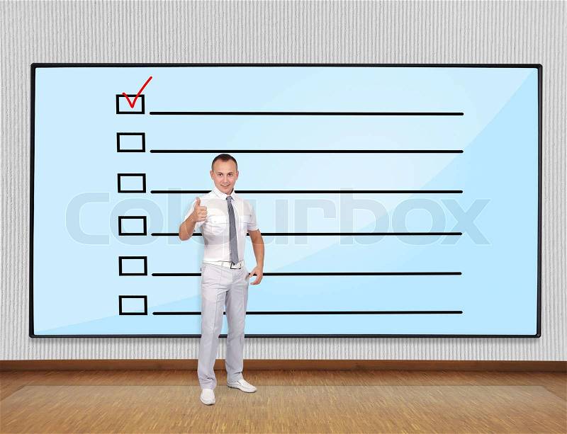 Businessman showing thumb up and plasma with check box, stock photo