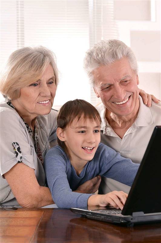 Boy with his grandparents, stock photo
