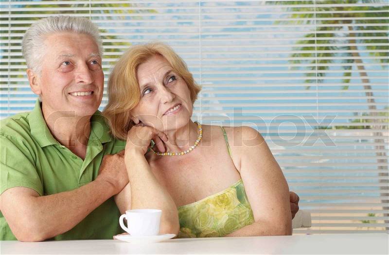 Happy mature couple enjoying a summer holiday, stock photo