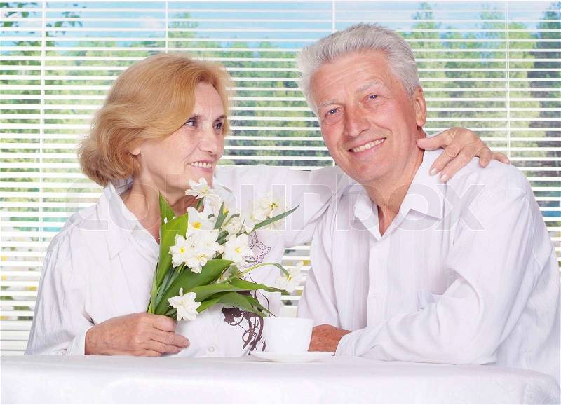 Happy mature couple enjoying a summer holiday, stock photo