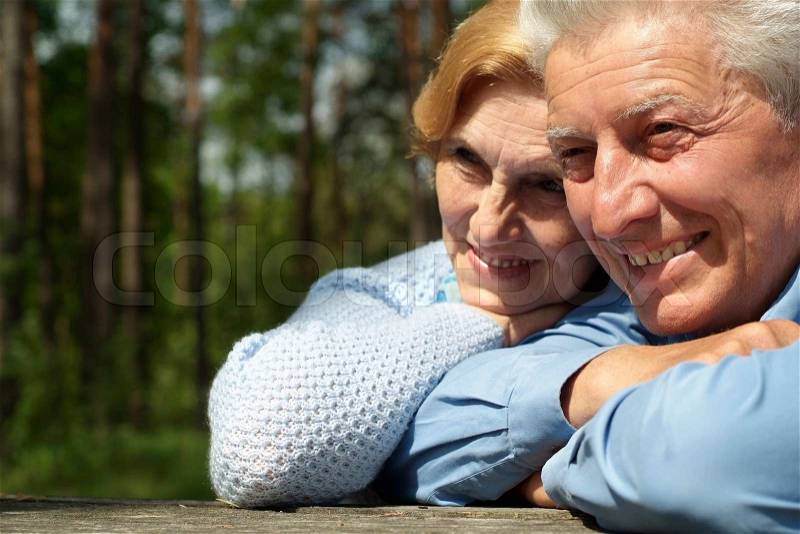 Beautiful old people went for a walk on the nature, stock photo