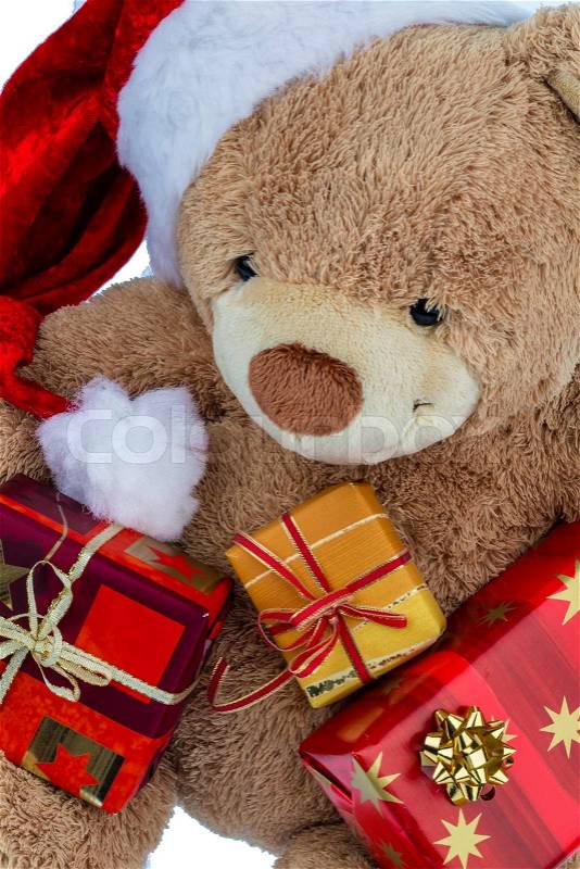 Teddy bear with christmas gifts, stock photo