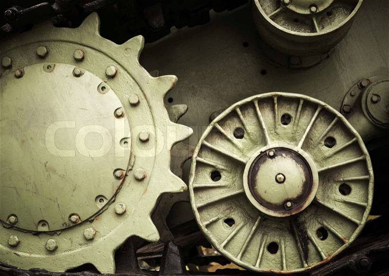 Heavy industry engineering background with dark green tractor gears, stock photo