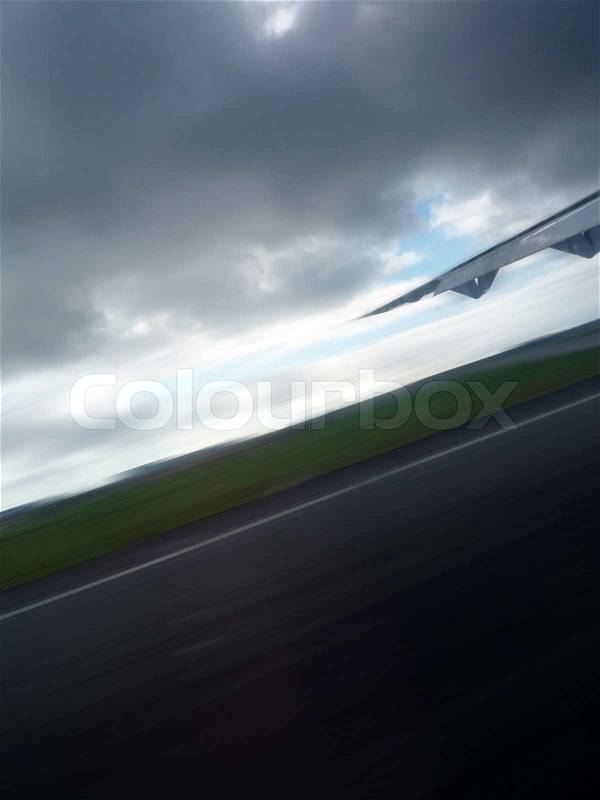Looking out the wing during take off / landing, stock photo