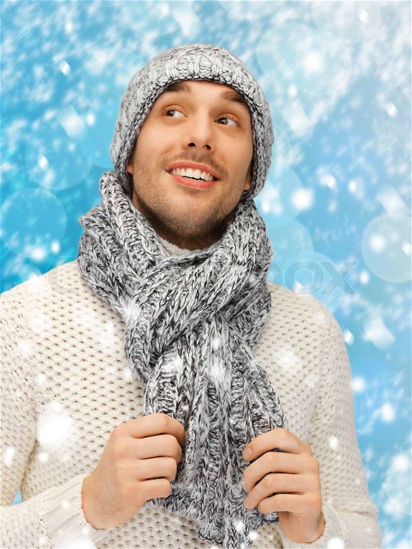 https://www.colourbox.com/preview/7754474-handsome-man-in-warm-sweater-hat-and-scarf.jpg