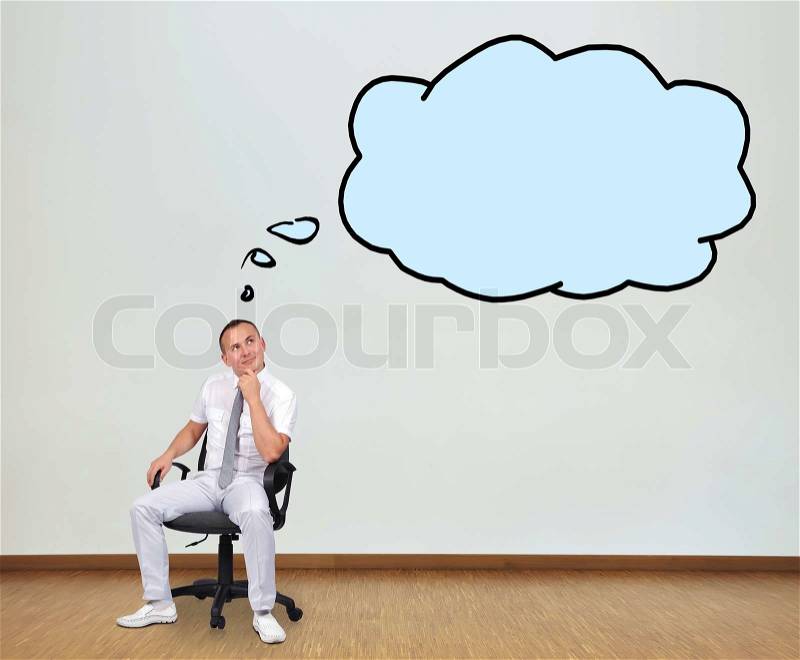 Man sitting on chair and dreaming, stock photo