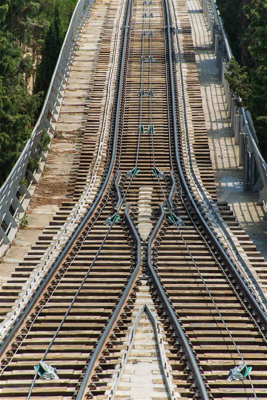Rail tracks in bright summer day, stock photo