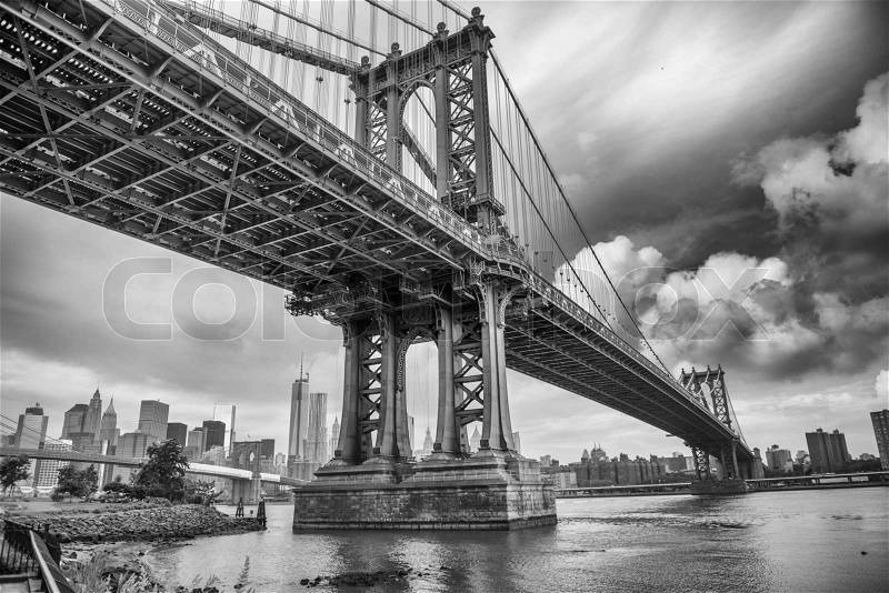 The Manhattan Bridge, New York City. Awesome wideangle upward view, stock photo