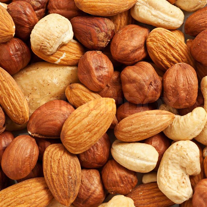 Background from various kinds of nuts almond, hazelnut, cashew, Brazil nut, stock photo