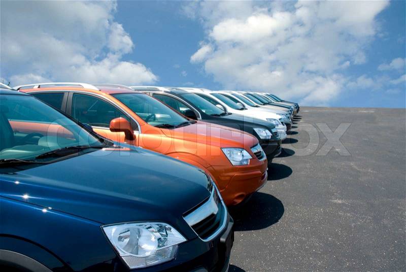 New fuel efficient SUV\'s on a car dealers lot for sale. , stock photo
