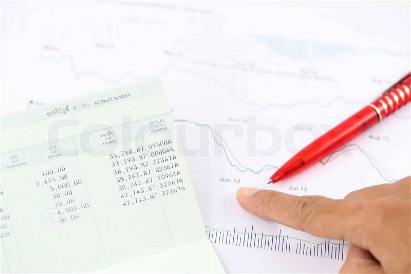 Account book report with hand of someone, stock photo