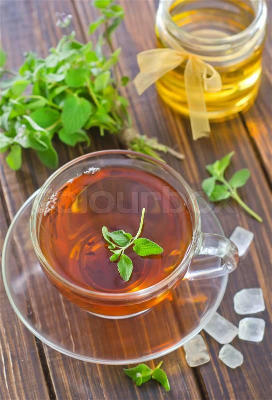 Tea with mint and honey, stock photo