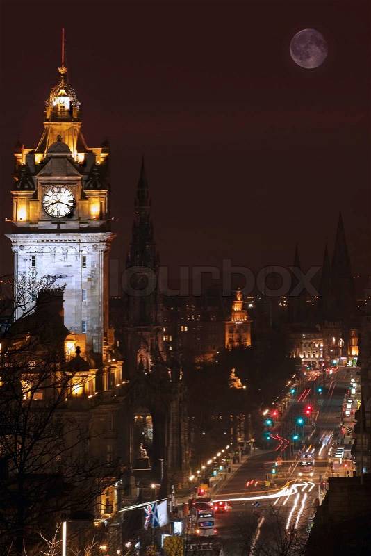 Princess street in Edinburgh at night with full Moon, stock photo